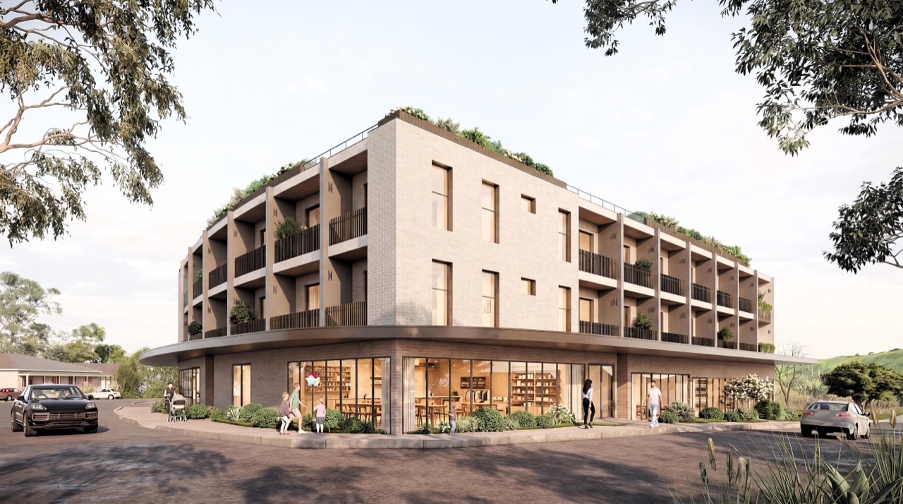 Architectural render of Bowen Aviary: a three-storey building with warm cream brickwork, deep planted balconies on every level, a curved corner, rooftop garden, and ground-floor café with floor-to-ceiling windows. Native eucalypts frame the streetscape.